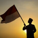 Poster pemilu Indonesia terbaru 2024 menampilkan logo resmi, tanggal pemungutan suara, dan simbol partai politik.