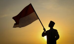 Poster pemilu Indonesia terbaru 2024 menampilkan logo resmi, tanggal pemungutan suara, dan simbol partai politik.