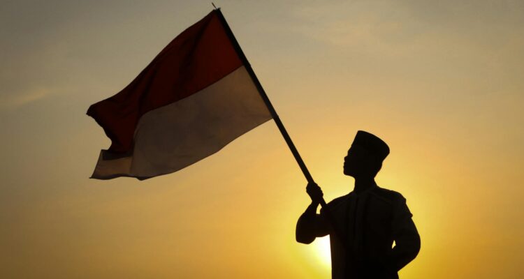 Poster pemilu Indonesia terbaru 2024 menampilkan logo resmi, tanggal pemungutan suara, dan simbol partai politik.